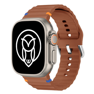 Ultra watch band in brown, displayed on an Apple Watch.