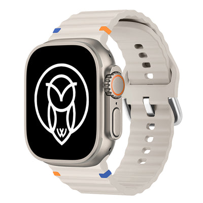  Light gray ultra watch band with silver buckle on Apple Watch.