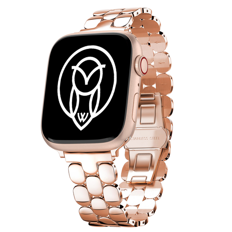 Rose gold stainless steel Apple Watch band displayed upright with a black watch face.